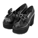 Black platform loafers with a heart-shaped bow detail.