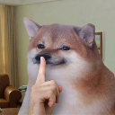 Cheems the Shiba Inu holding a finger to its mouth in a shushing gesture.