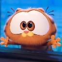 Baby Garfield with wide eyes staring intently at a screen.