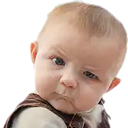 Baby looking sideways with a skeptical and judgmental expression.