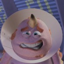 A purple 3D character making an awkward, pained grimace with teeth clenched.