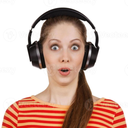 Woman wearing black headphones with a shocked expression and mouth wide open.