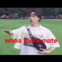 Young man with a headband holds his hand out in a stop gesture with the text whoa there mate overlaid.