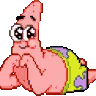 Patrick Star lying on his stomach with a blushing expression and kicking his feet in the air.