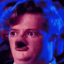 A human face with heavily distorted features and a wide-open mouth showing a look of intense shock.