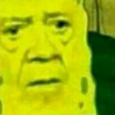 Distorted human face with a confused and serious expression rendered in a bright yellow, deep-fried aesthetic.