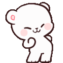 A small white kitten with large, shiny, pleading eyes and paws held together in a begging gesture.