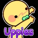 A yellow baby-like character with a green pacifier reaching its arms upward with the text Uppies below.
