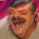 El Risitas laughing with his mouth wide open and eyes squinted.