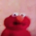 Elmo with a wide-eyed, shocked expression looking completely bewildered.