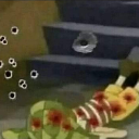SpongeBob lying on the ground covered in bullet hole wounds.