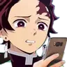 Tanjiro Kamado looking at a smartphone with a disgusted and shocked expression.