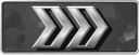 Silver metallic double-chevron symbol pointing to the right on a dark background.