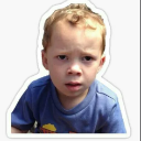 Young boy with a confused and skeptical facial expression.