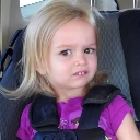 Chloe looking sideways with a skeptical and confused facial expression.
