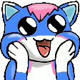 Blue cat with wide eyes and tongue out holding its face in excitement.