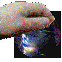 A hand rhythmically petting an object in a repeating animation.