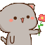 A cute gray cat holding out a red flower with a happy expression.