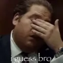 Jonah Hill covering his eyes with his hand in a gesture of defeat with the text I guess bro below.