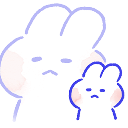 Two white bunnies with blank, unimpressed expressions staring forward.