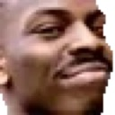 Kayode Ewumi smiling and pointing to his temple with a smug expression.