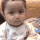 Baby with a skeptical and judgmental facial expression.