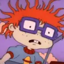 Chuckie Finster from Rugrats looking shocked with wide eyes and messy orange hair.