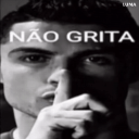 Cristiano Ronaldo making a shush gesture with his finger over his lips with the text Nao Grita.