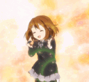 Yui Hirasawa from K-On! dancing joyfully against a warm, glowing background.