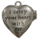 Heart-shaped silver locket with the text i carry your heart with me engraved on the front.