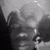Travis Scott covering his face with his hand in a series of frames.