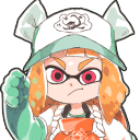 Inkling character with orange hair and a green hat clenching their fist in a determined gesture.