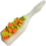 A white plastic paddle covered in orange and green plastic building bricks.