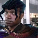Man with a dark hairstyle looking sideways with a skeptical and unimpressed expression.