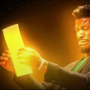 Jimmy Butler squinting intensely at a bright, glowing piece of paper.