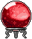 Crystal ball glowing red on a silver stand in pixel art style.