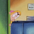 A cartoon character with wide eyes peeking from behind a green wall.