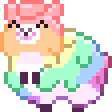 A colorful rainbow creature with a happy expression rolling across the frame in a pixel art style.