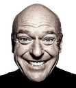 Hank Schrader smiling with an intense and slightly uncomfortable expression.