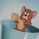 Jerry Mouse looking smitten while holding a heart against his chest.
