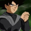 Goku Black smiling smugly while slowly clapping his hands together.