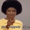 Michael Jackson pointing directly at the camera with a serious expression and a caption that says you raggedy bitch.