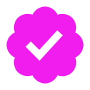 A black checkmark inside a bright pink scalloped badge shape.