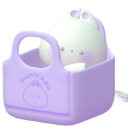 A tiny white creature with a soft expression sitting inside a small purple tote bag.