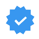 Blue badge with a white checkmark inside representing verification.