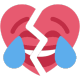 A red heart split down the middle with a laughing face and blue tears streaming from its eyes.