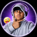 A young person wearing a hoodie and headphones poses with a hand on their chin, accompanied by a winking emoji.