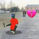 A masked person in a red shirt sits in a desolate parking lot next to a pink broken heart icon.