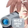 Inugami Korone smiling while holding a camcorder with the text Nice Desu Ne on the screen.