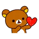 Rilakkuma the brown bear holding a red heart with a happy expression.